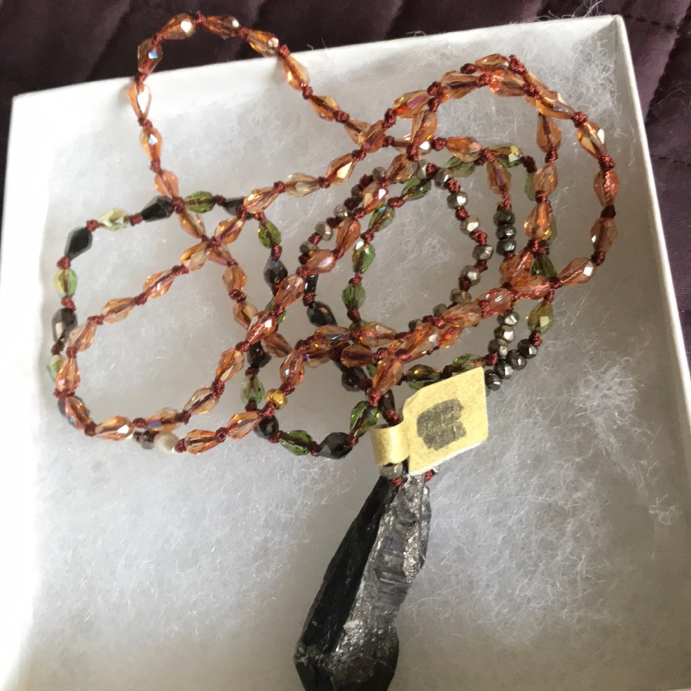Beaded necklace with stone pendant